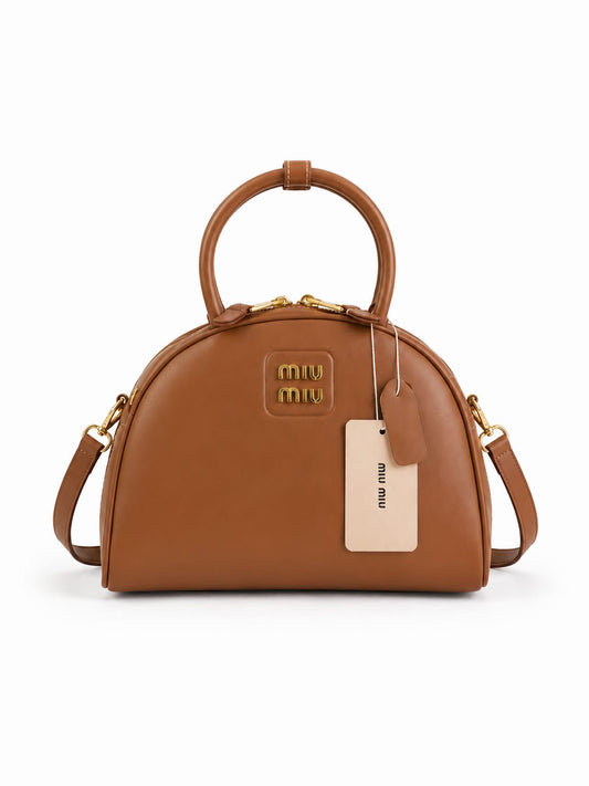 Miu Miu Beau bowling bag featuring gold-tone