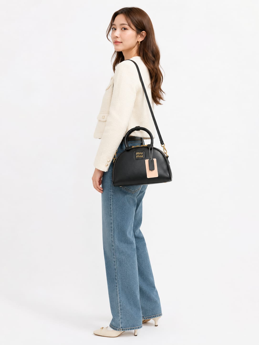 Miu Miu Beau bowling bag featuring gold-tone