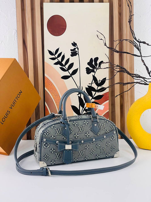 Louis Vuitton denim cross bag